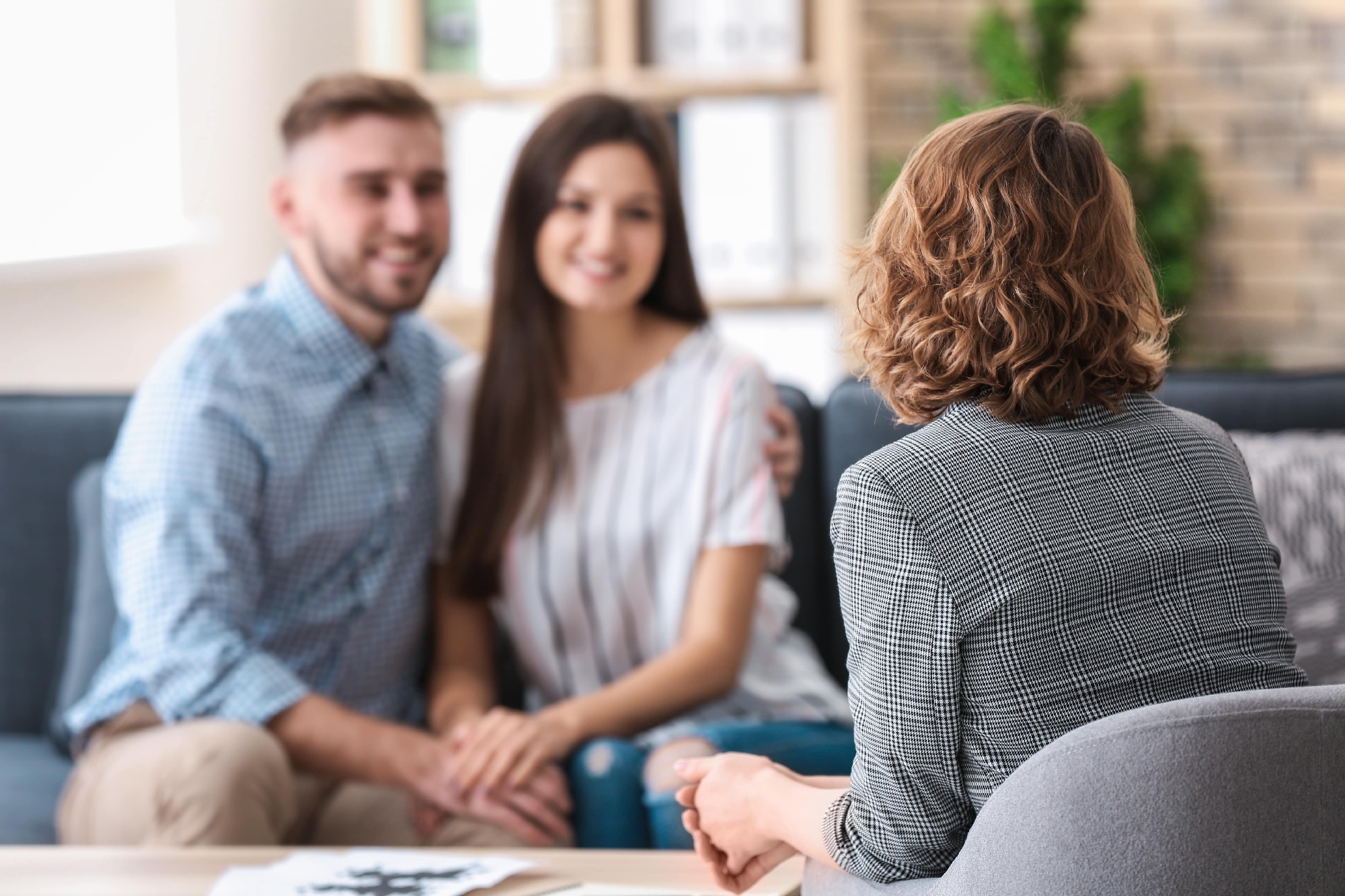 Counselor working with a couple Counselor working with a couple