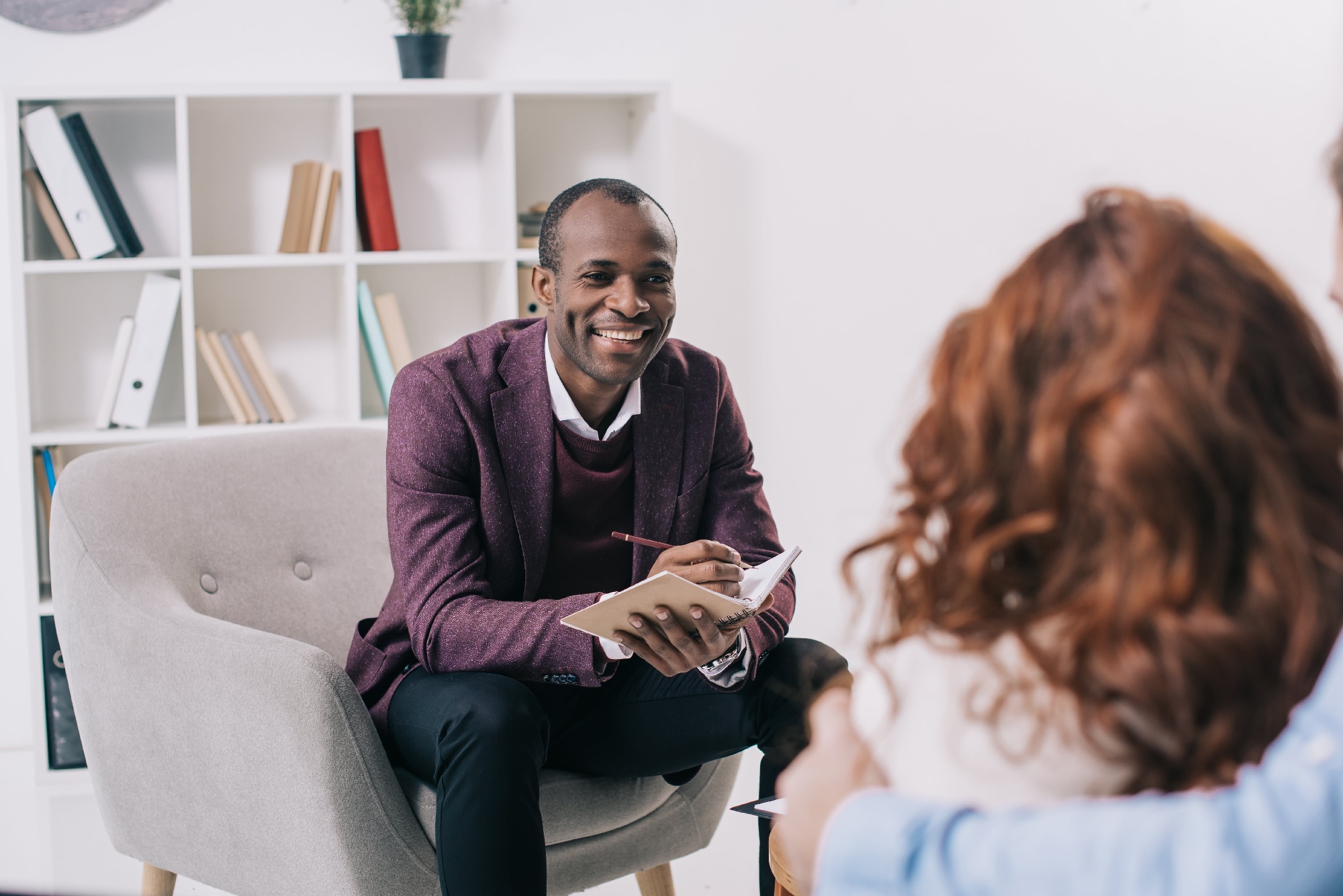 Counselor working with clients