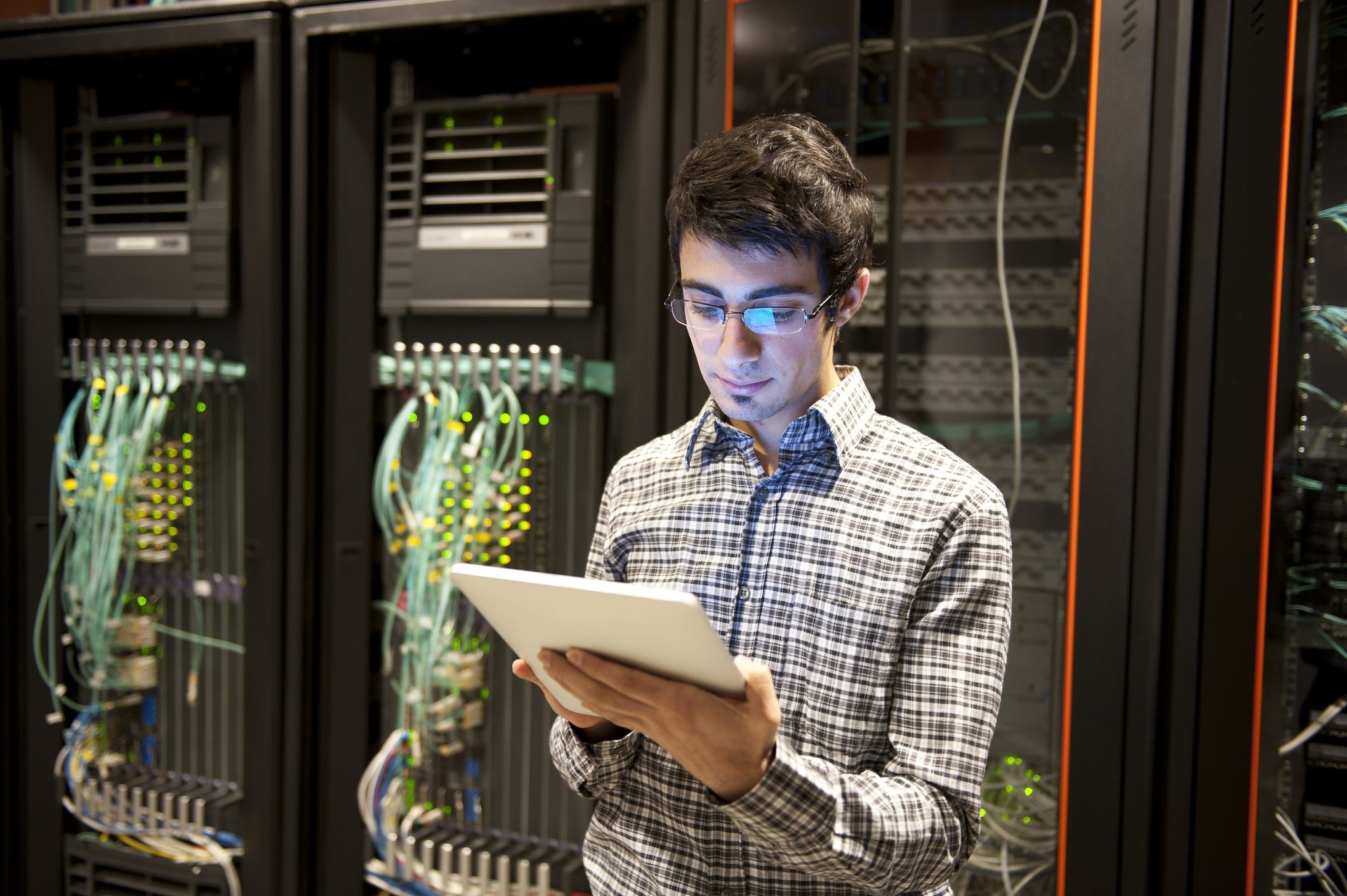 male network administrator in server room